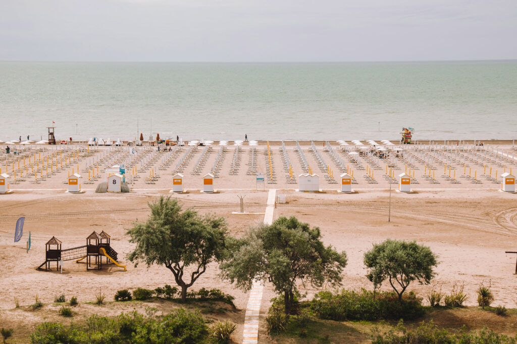view of Caorle's levante beach and the horizon from a hotel terrace